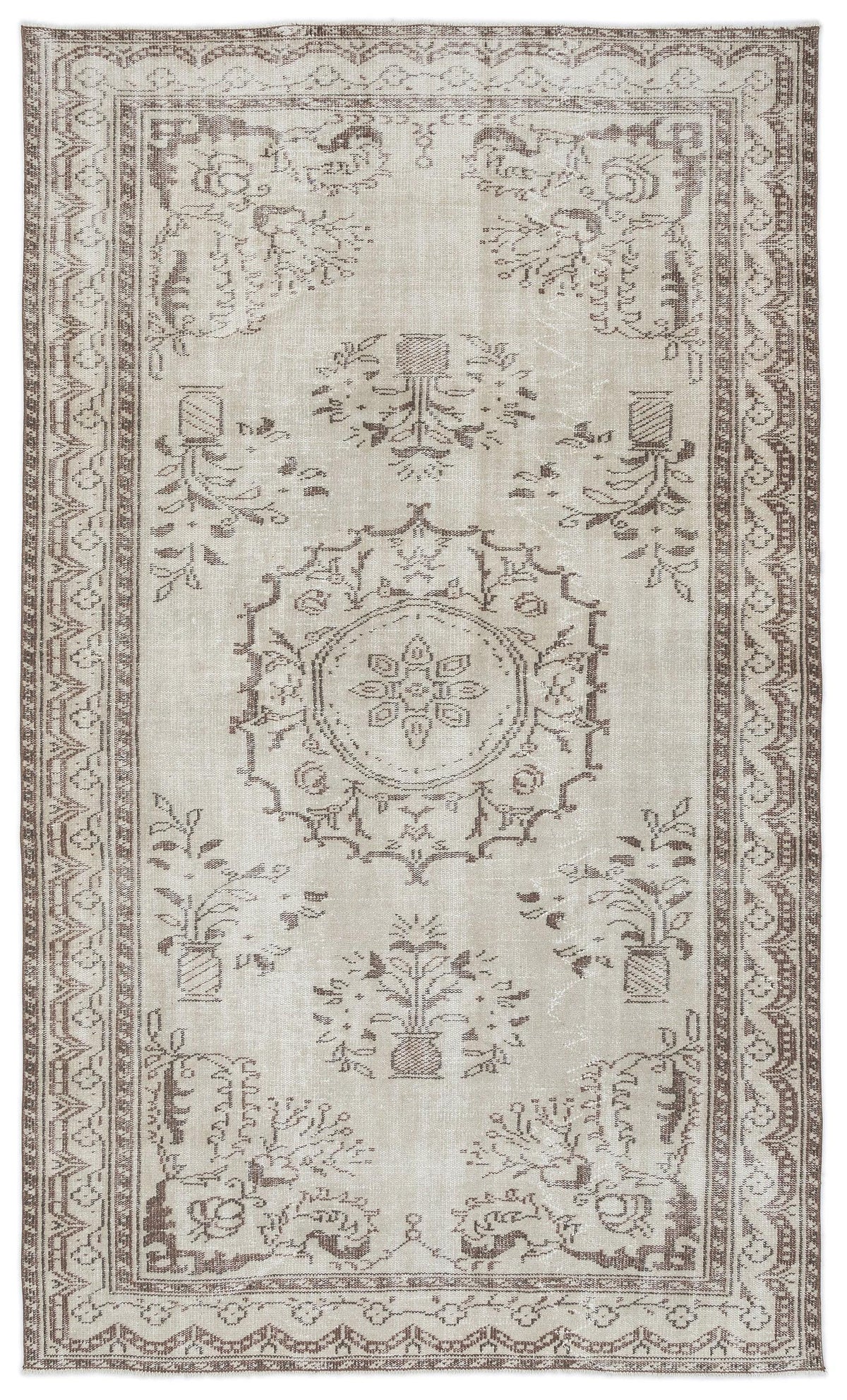 Beige and brown vintage-style rug with a central floral medallion and potted plant motifs, featuring a geometric border.