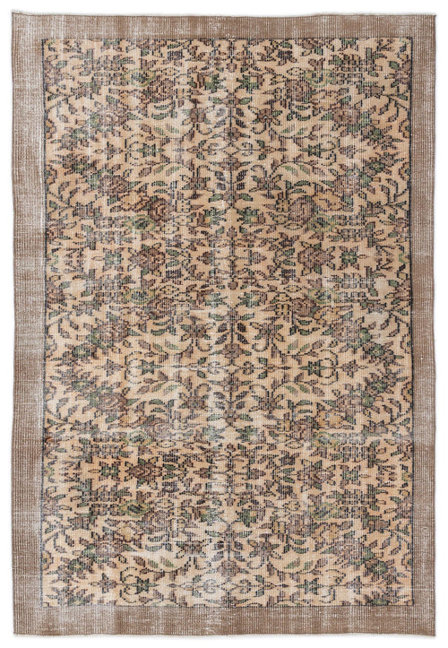 Load image 1 in gallery view. Distressed beige and brown rug with a repeating floral medallion pattern and a solid border.