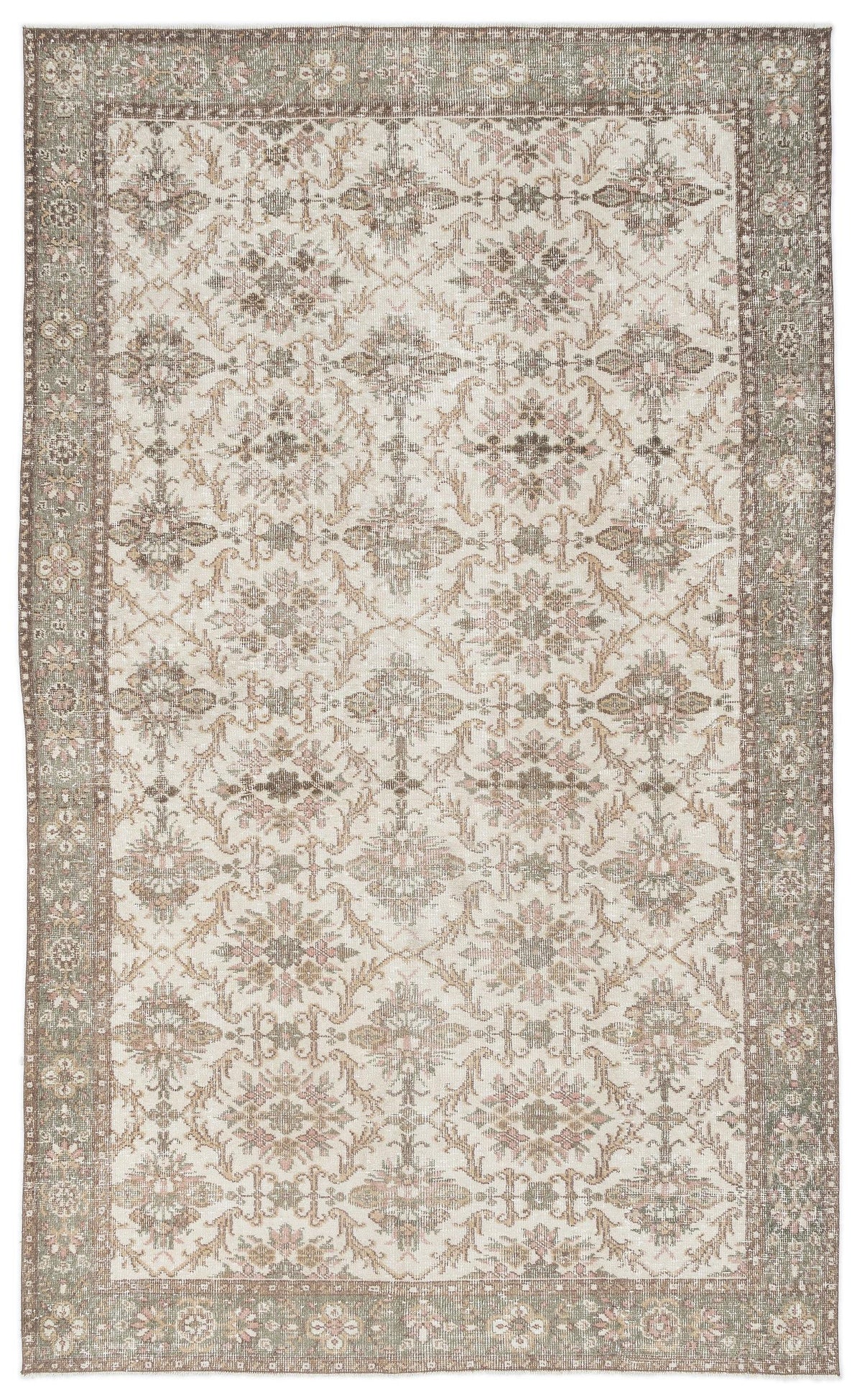 Cream, sage green, and brown traditional rug with a distressed floral medallion pattern and a wide decorative border.