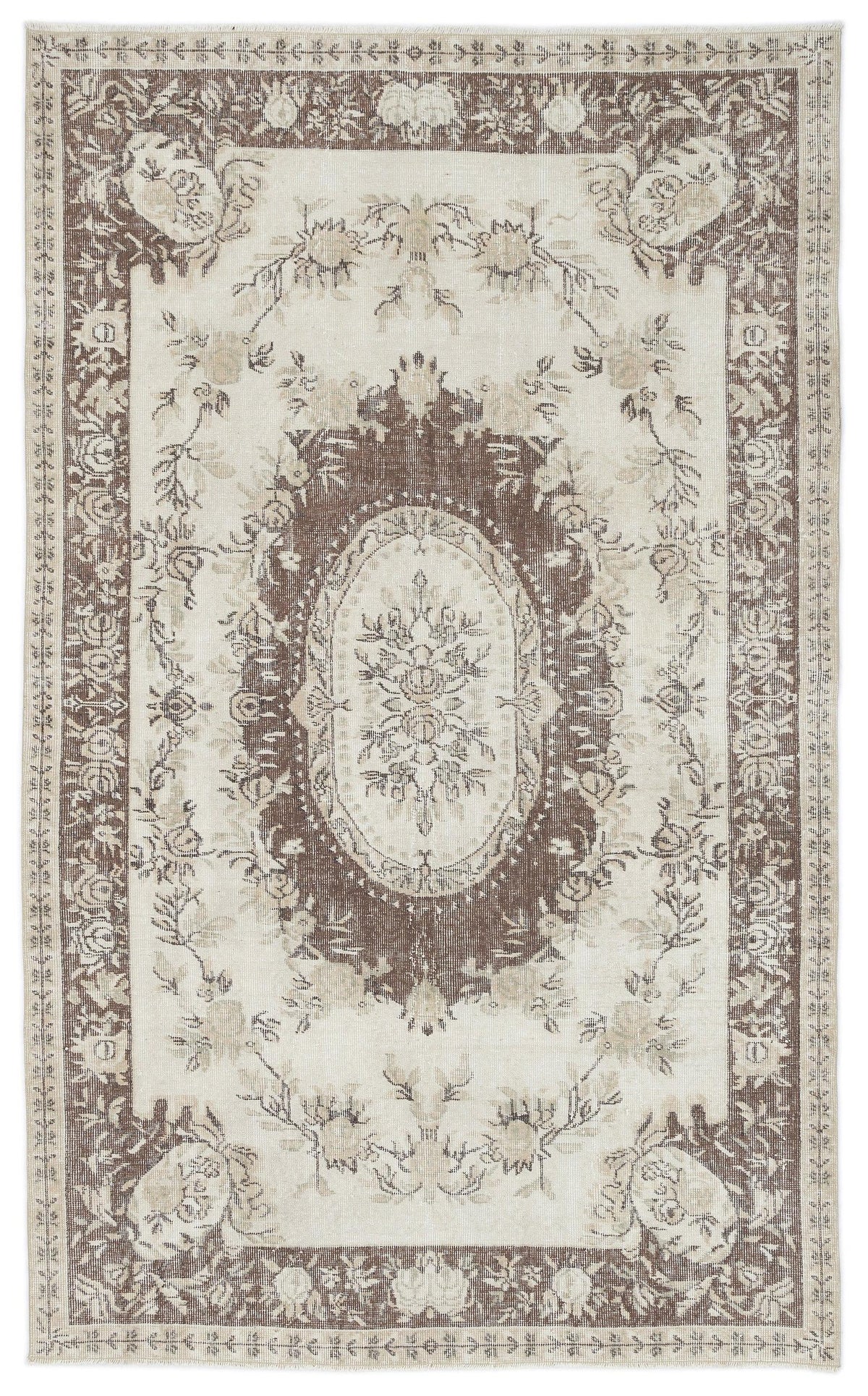 Cream and brown traditional rug with a central floral medallion and ornate botanical border.