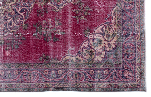Load image 1 in gallery view. Deep red distressed rug with a traditional floral medallion pattern and a dark navy border.