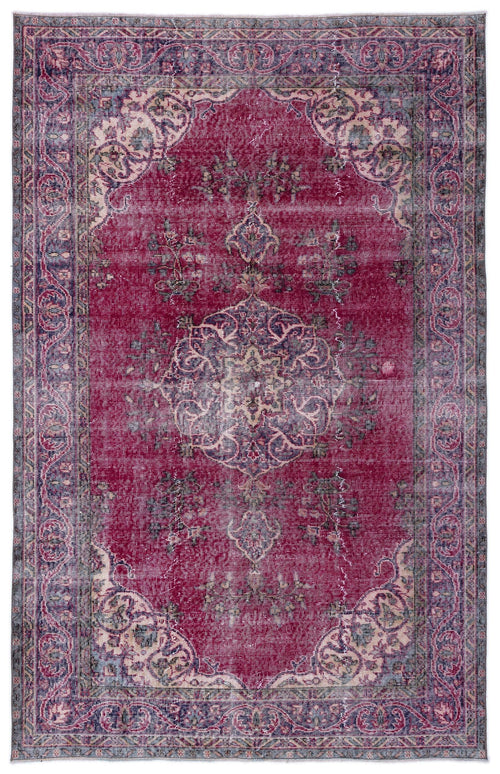 Load image 1 in gallery view. Distressed magenta and navy blue traditional rug with a central floral medallion and ornate border.