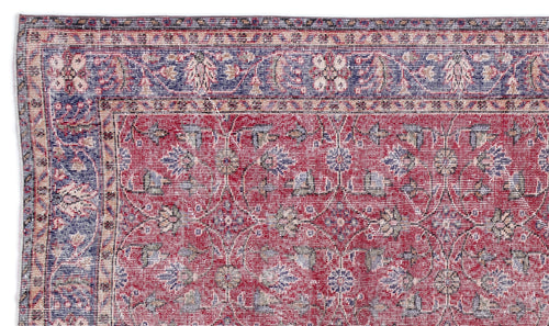 Load image 1 in gallery view. Red and blue traditional Persian-style rug with a floral vine pattern and a decorative border.
