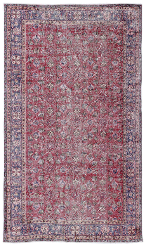 Load image 1 in gallery view. Distressed red and blue traditional rug with a floral medallion pattern and a wide decorative border.