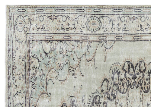 Load image 1 in gallery view. Sage green and beige rug with a distressed traditional floral medallion pattern and a detailed geometric border.