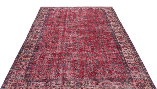 Load image 1 in gallery view. Distressed red Persian-style rug with a dark floral medallion pattern and a wide decorative border.