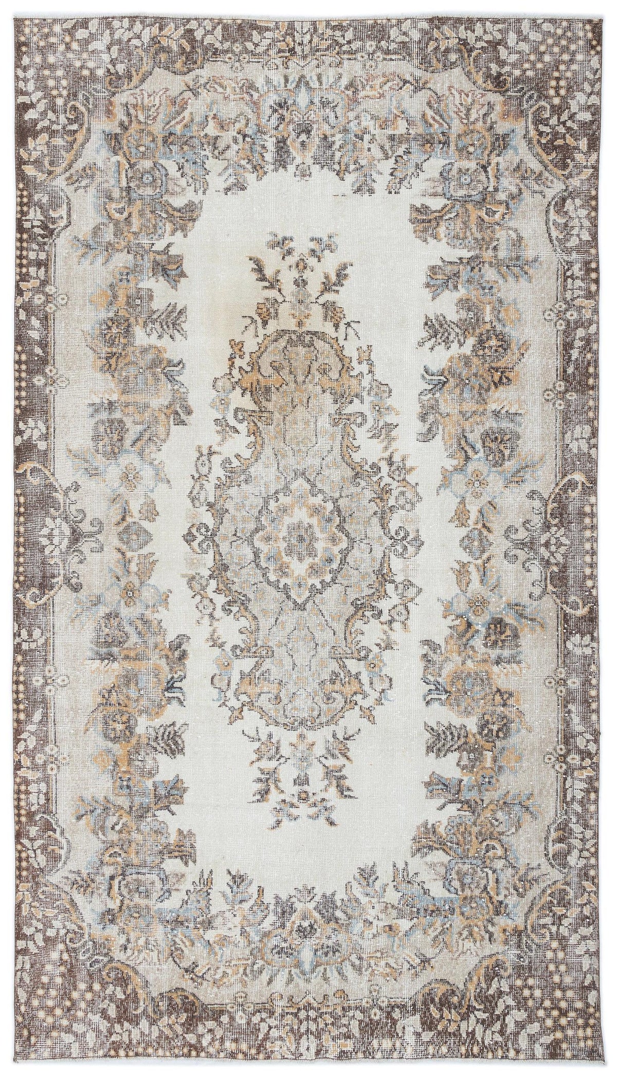Distressed cream rug with a central floral medallion and dark brown border in a traditional Persian-style pattern.