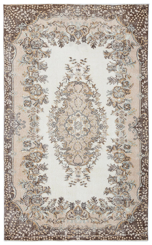 Load image 1 in gallery view. Cream and brown traditional rug with a central floral medallion and ornate border on a white background.