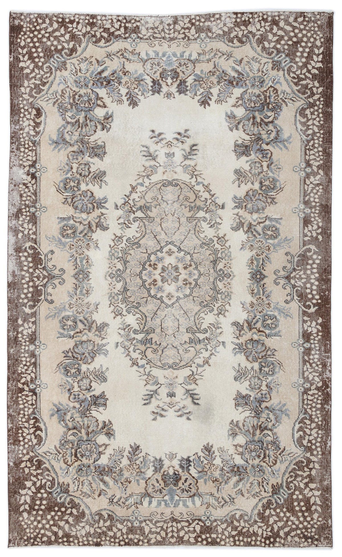 Cream, brown, and blue traditional rug with a central floral medallion and ornate border on a white background.