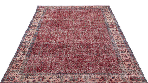 Load image 1 in gallery view. Distressed red and cream traditional rug with an intricate floral medallion pattern and a wide decorative border.