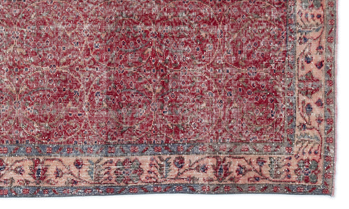 Load image 1 in gallery view. Distressed red and cream traditional rug with a faded floral medallion pattern and a detailed botanical border.