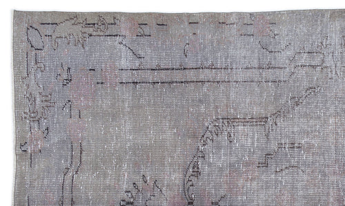 Load image 1 in gallery view. Grey and taupe distressed rug with a faded, abstract linear pattern on a white background.