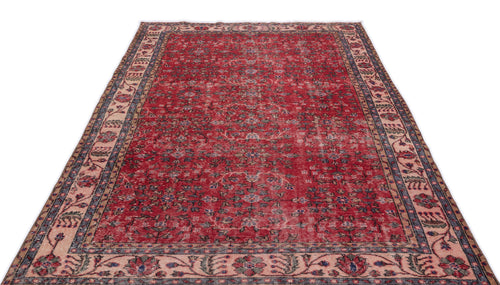 Load image 1 in gallery view. Distressed red traditional rug with a floral pattern and a wide, multi-colored border on a white background.