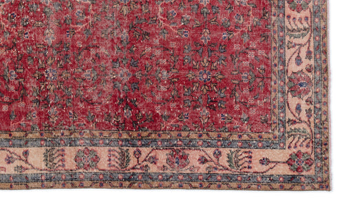 Load image 1 in gallery view. Red traditional rug with a distressed floral pattern and a beige border featuring intricate botanical motifs.