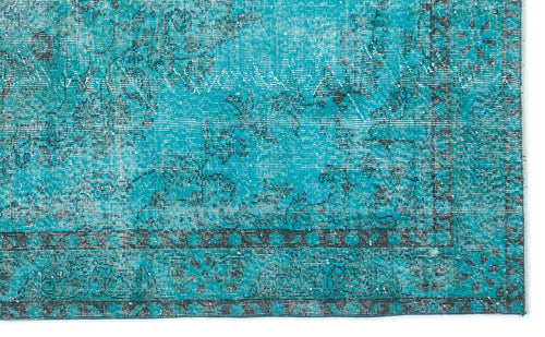 Load image 1 in gallery view. Turquoise and charcoal distressed rug with a traditional floral medallion pattern and a geometric border.
