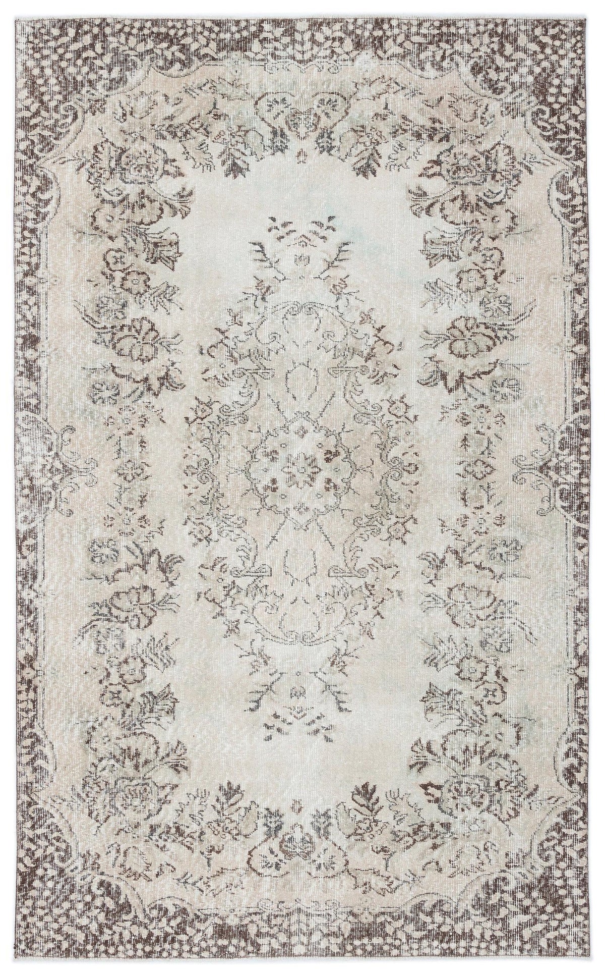 Beige and brown distressed rug with a traditional floral medallion pattern and ornate border.