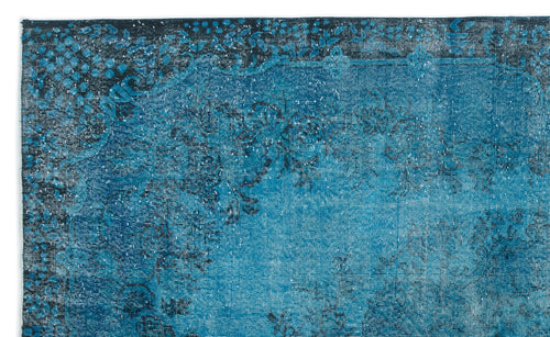 Load image 1 in gallery view. Teal and black distressed rug with a traditional floral medallion pattern and ornate border.