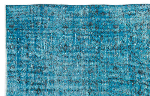 Load image 1 in gallery view. Bright turquoise rug with a distressed, faded traditional floral pattern in dark grey.