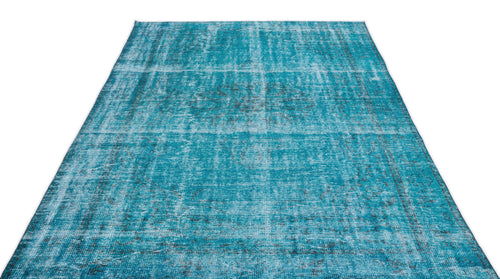 Load image 1 in gallery view. Teal and black distressed area rug with a faded traditional medallion pattern on a white background.