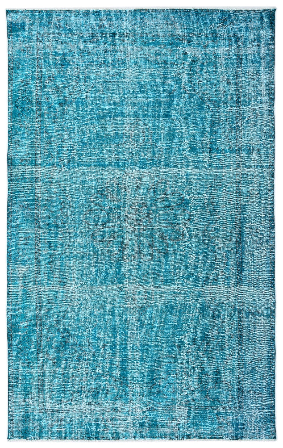 Bright turquoise distressed rug with a faint, traditional central medallion and border pattern.