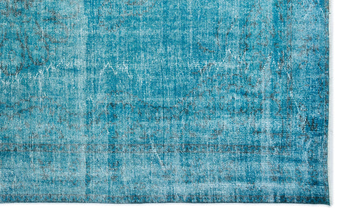 Load image 1 in gallery view. Teal and blue distressed rug with a faded, vintage-style overdyed pattern.