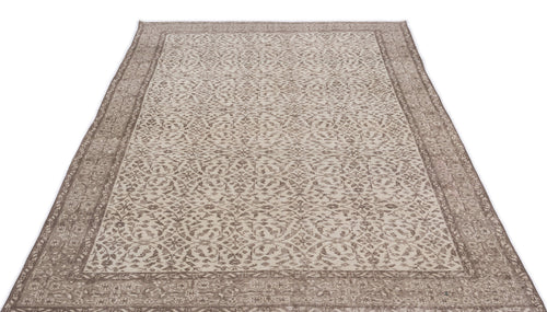Load image 1 in gallery view. Taupe and cream area rug with a distressed traditional floral medallion pattern and a wide decorative border.