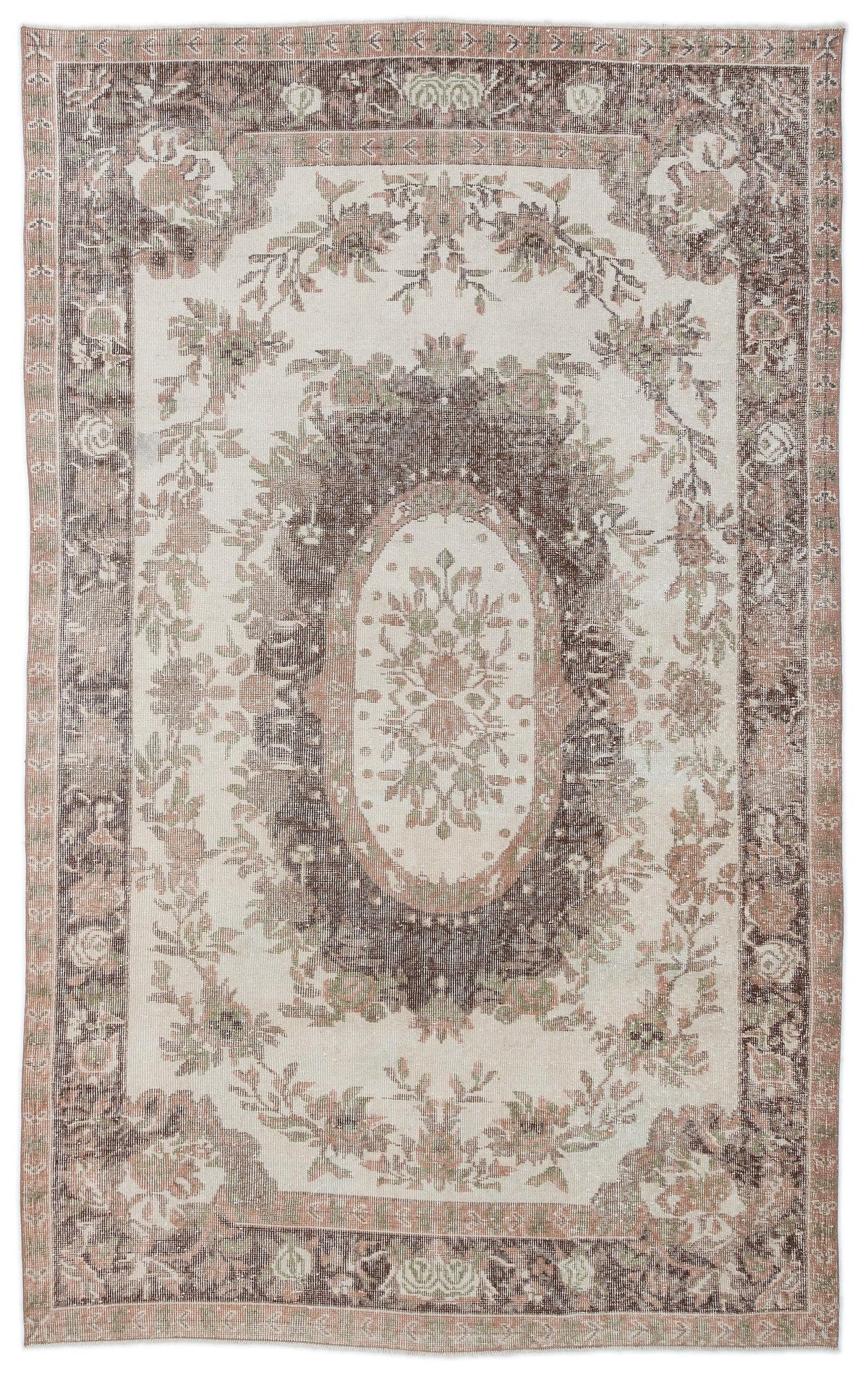 Distressed cream, brown, and muted pink rug featuring a central floral medallion and ornate botanical border.