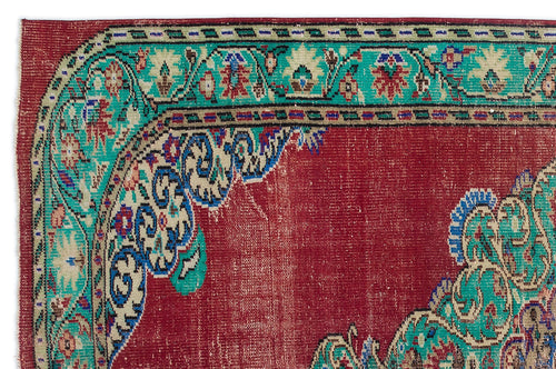 Load image 1 in gallery view. Red vintage-style rug with a teal and cream floral medallion border and intricate traditional patterns.