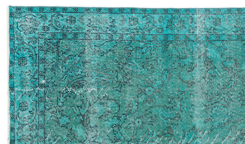Load image 1 in gallery view. Teal and black distressed rug with a traditional floral medallion pattern and a detailed border.