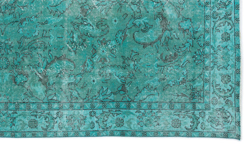 Load image 1 in gallery view. Teal and black distressed rug with a traditional floral medallion pattern and a detailed border.