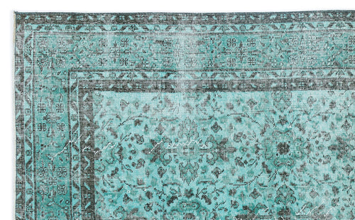 Load image 1 in gallery view. Teal and charcoal distressed rug with a traditional ornate floral medallion pattern and a geometric border.