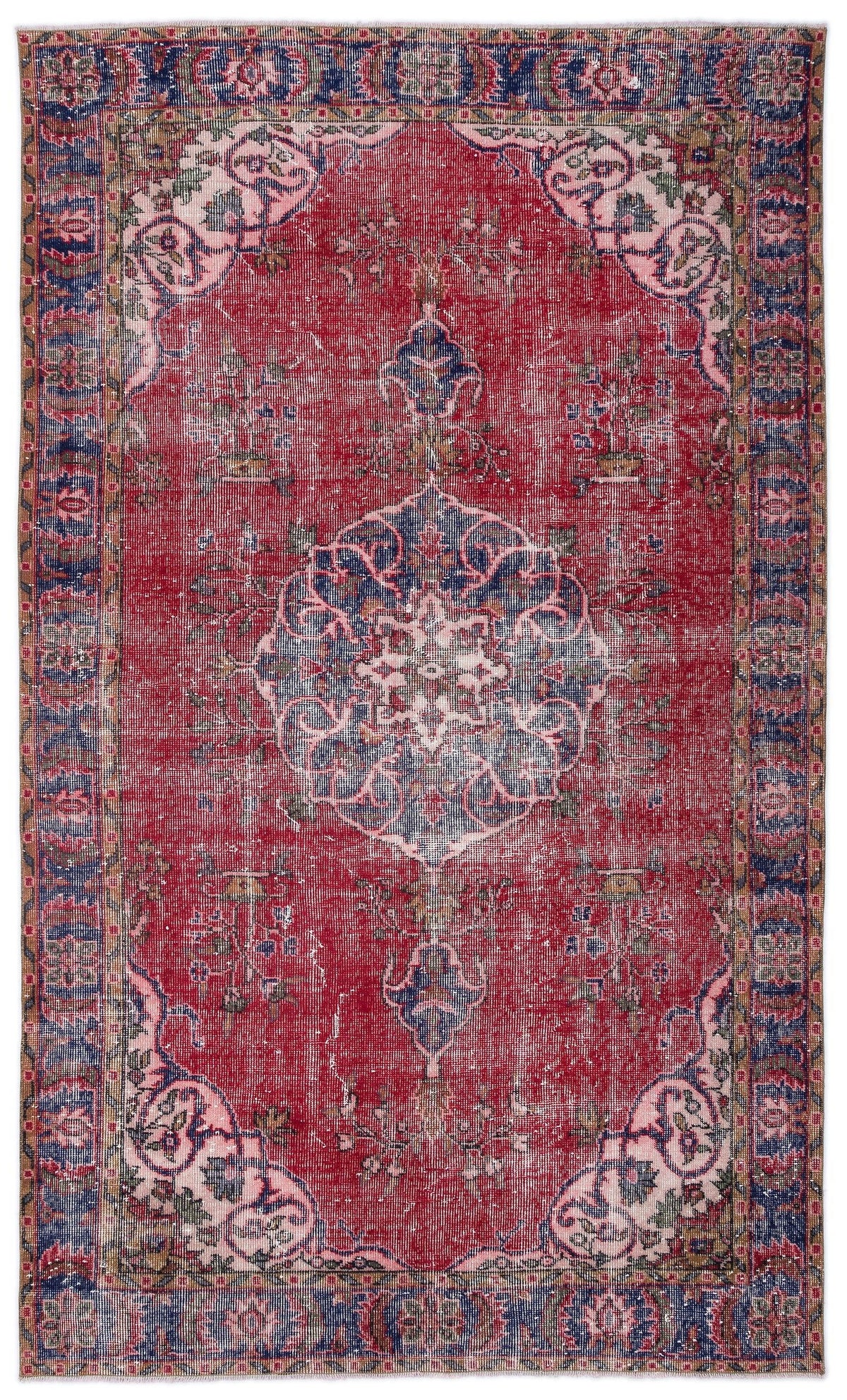 Distressed red Persian-style rug with a central blue medallion, floral motifs, and a decorative border.