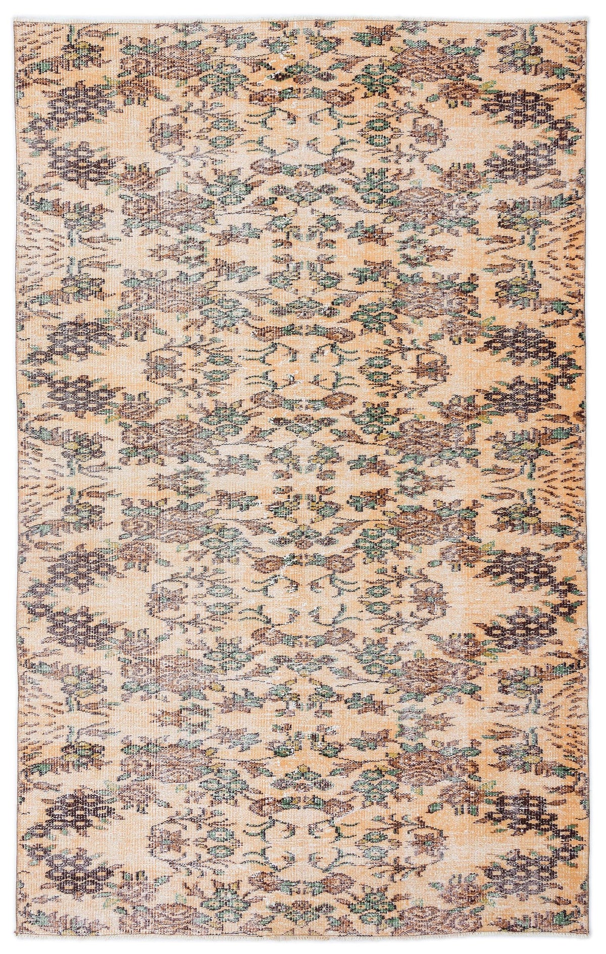 Peach-toned distressed rug with a repeating dark brown and sage green floral medallion pattern.