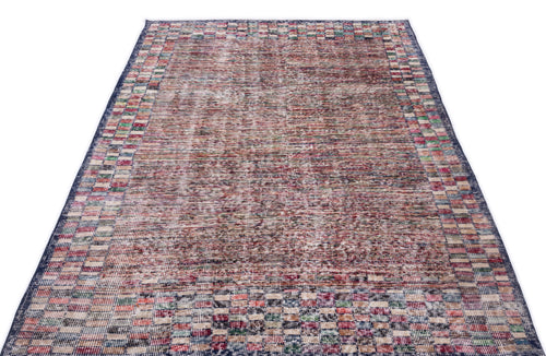 Load image 1 in gallery view. Distressed multi-colored rug with a central textured field and a checkered border on a white background.