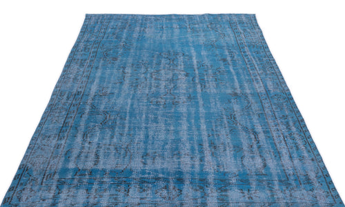 Load image 1 in gallery view. Blue distressed area rug with a faded traditional medallion pattern and dark grey border details.