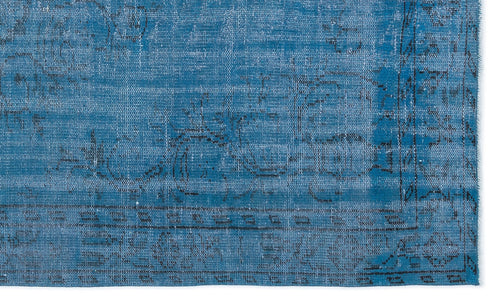 Load image 1 in gallery view. Bright blue distressed rug with a faded traditional medallion pattern and dark charcoal border details.