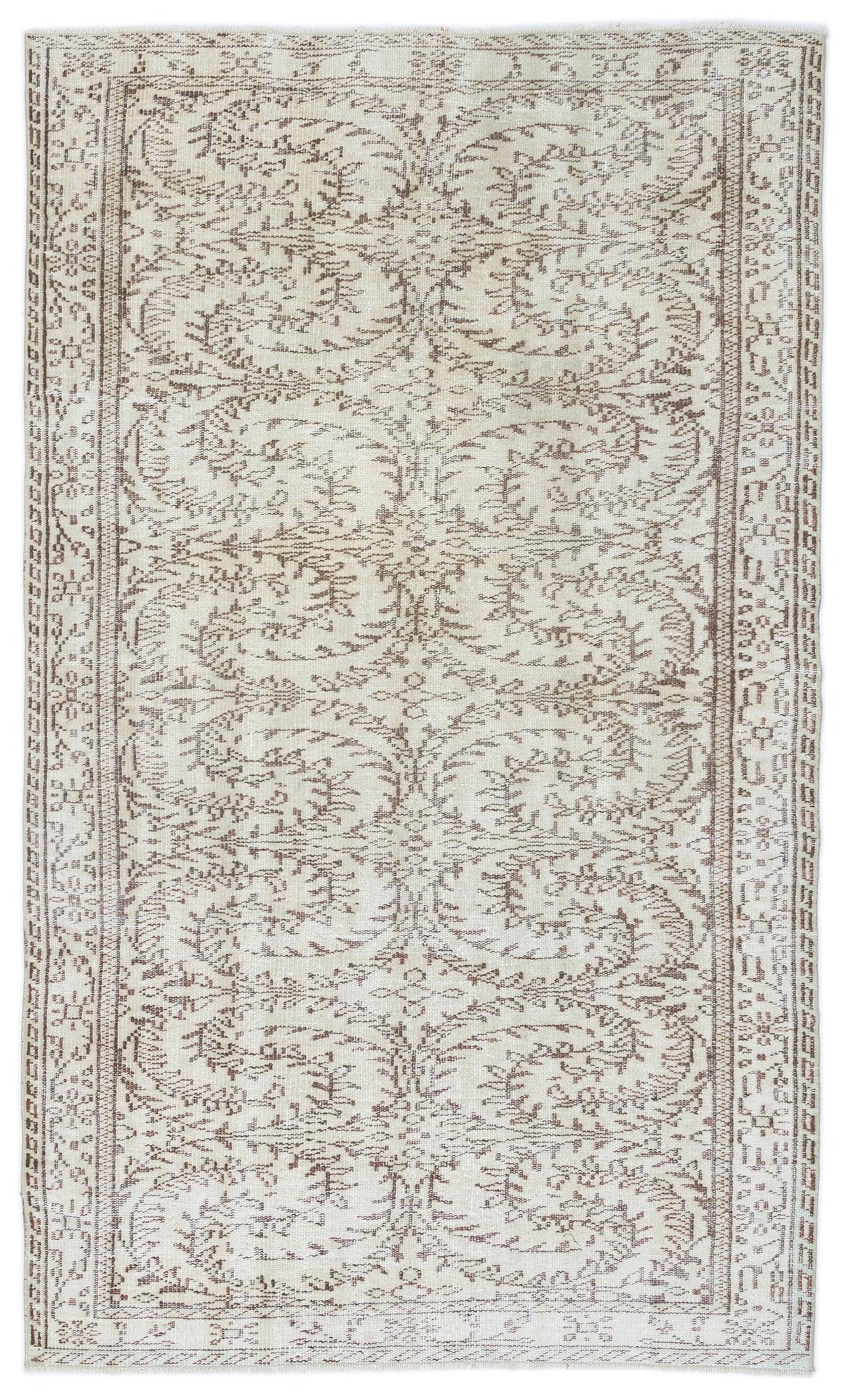 Beige and brown vintage-style rug with a symmetrical floral vine pattern and a decorative border on a white background.