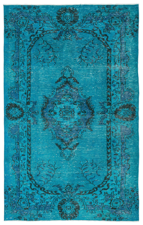 Load image 1 in gallery view. Turquoise and black distressed rug with a central medallion and ornate floral border on a white background.