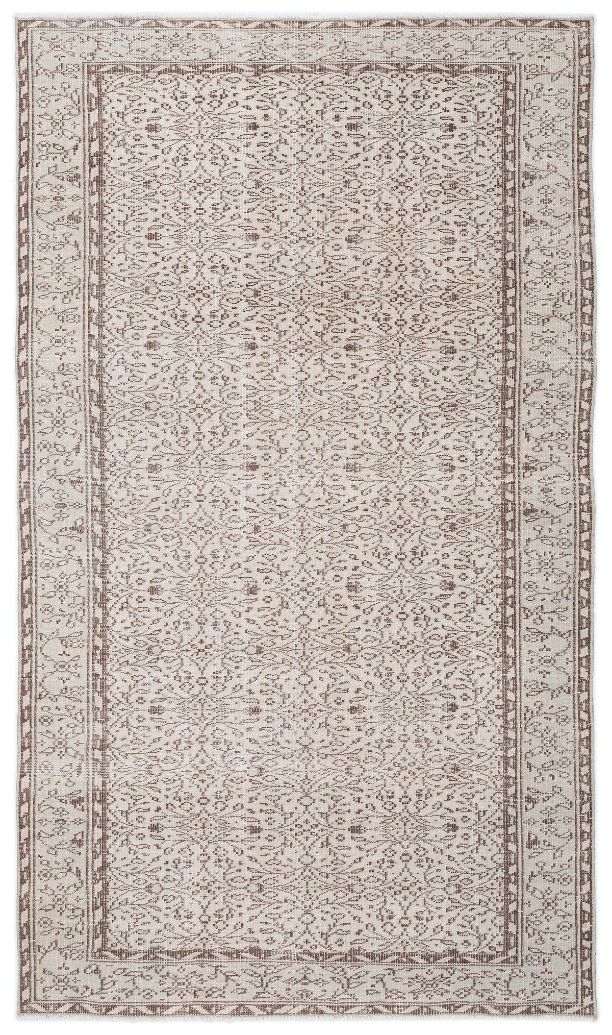 Beige and brown area rug with a traditional floral medallion pattern and a decorative border on a white background.