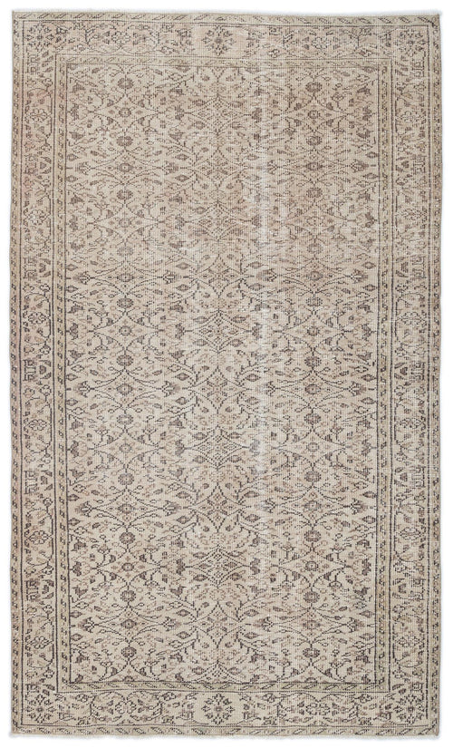 Load image 1 in gallery view. Beige and taupe vintage-style rug with a distressed floral medallion pattern and a detailed geometric border.