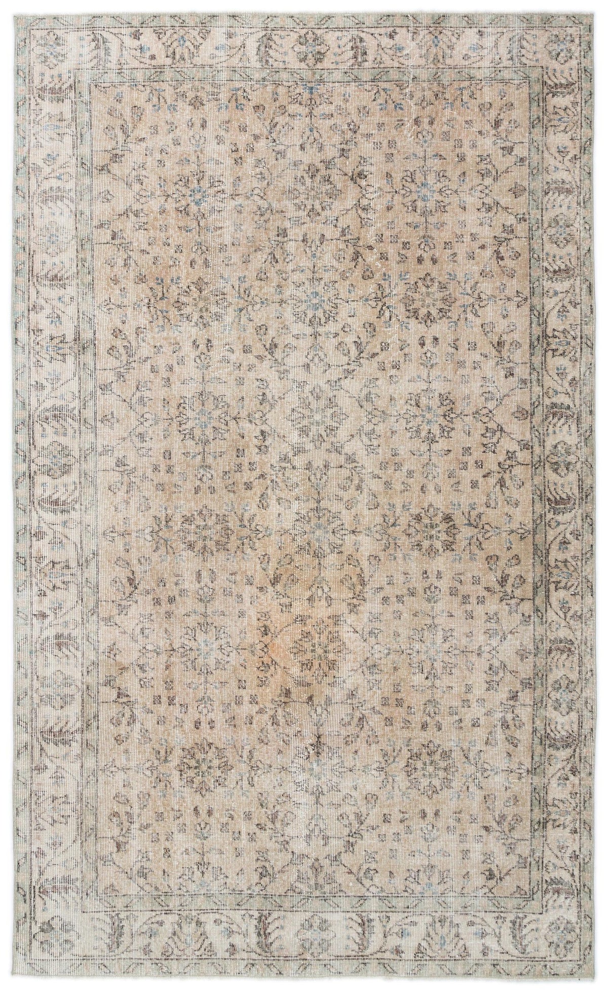 Beige and grey distressed traditional rug with a faded floral medallion pattern and a decorative border.