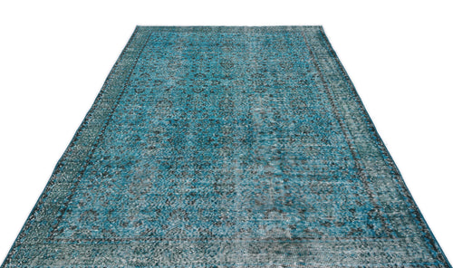 Load image 1 in gallery view. Teal and black distressed vintage-style rug with an intricate traditional medallion pattern on a white background.