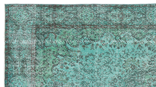 Load image 1 in gallery view. Teal and charcoal distressed rug with a traditional floral medallion border and intricate vine pattern.