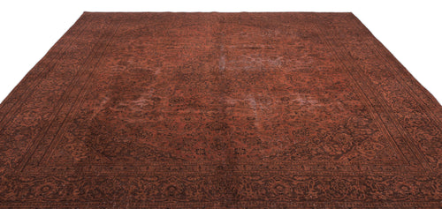 Load image 1 in gallery view. Deep red and dark brown traditional rug with an intricate floral medallion pattern and a wide decorative border.