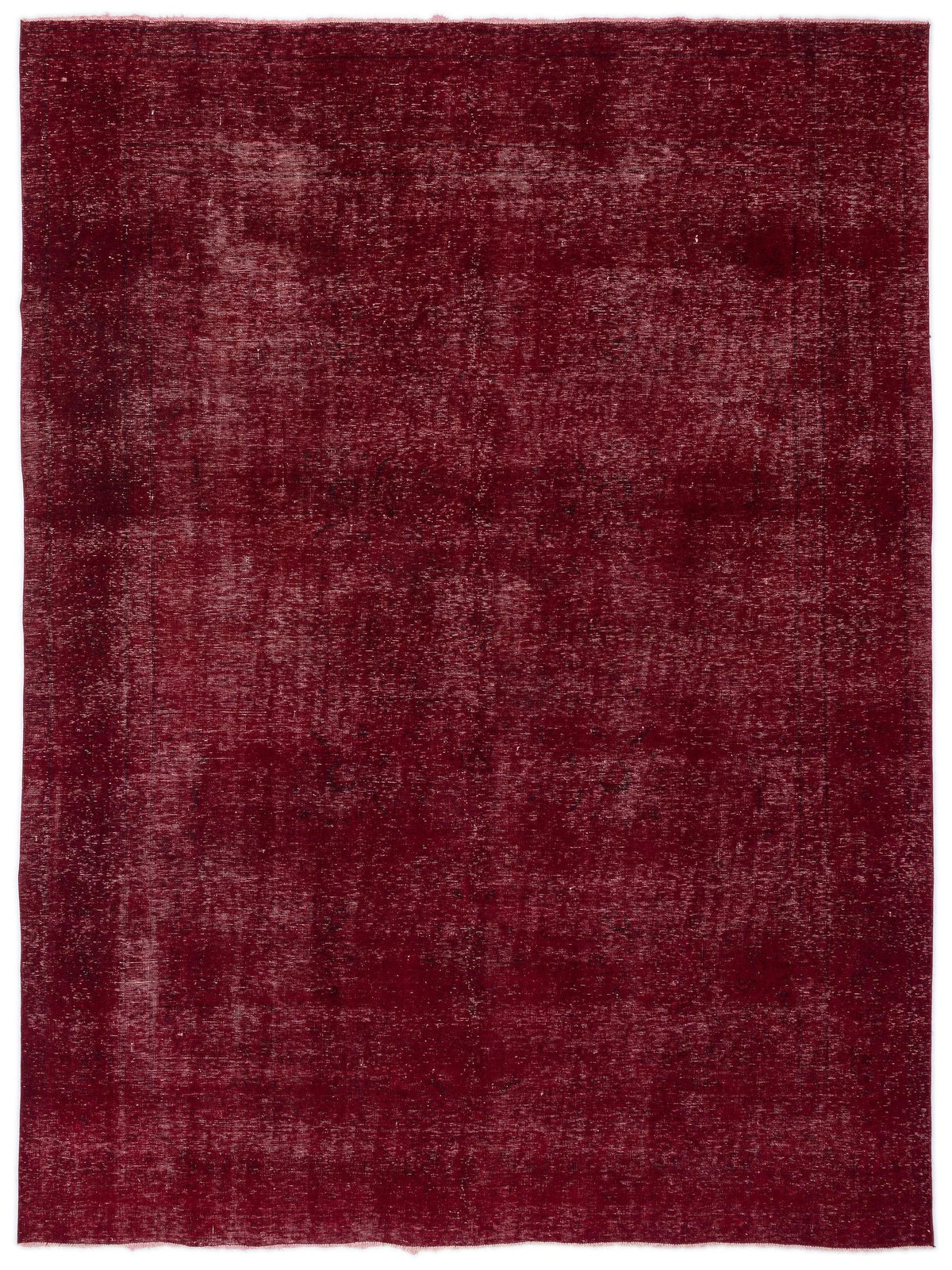 Deep red vintage-style rug with a distressed, faded texture and subtle border detail on a white background.