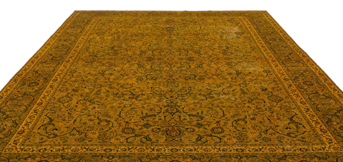 Load image 1 in gallery view. Mustard yellow traditional rug with an intricate black and multi-colored floral vine pattern and a wide border.