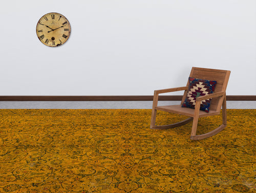 Load image 1 in gallery view. Mustard yellow rug with a dark floral vine pattern, styled in a room with a wooden rocking chair and wall clock.