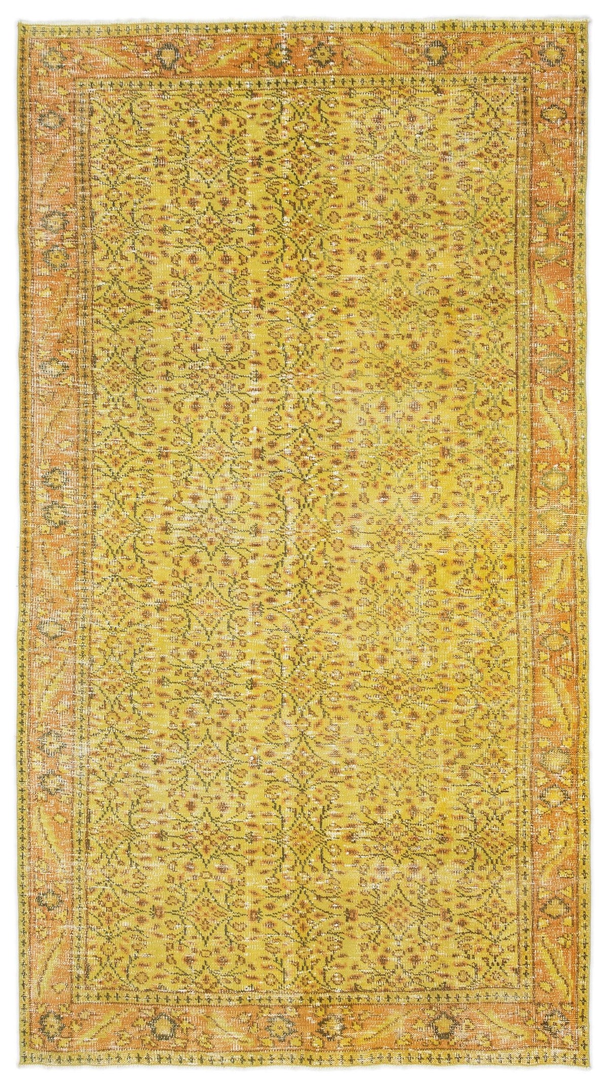 Yellow and orange vintage-style rug with a distressed floral medallion pattern and a decorative border.