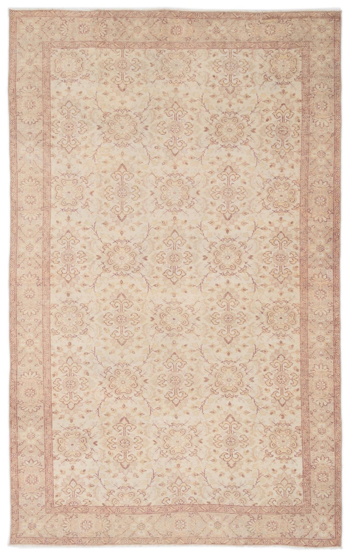 Beige and dusty rose traditional rug with a repeating floral medallion pattern and a bordered edge.