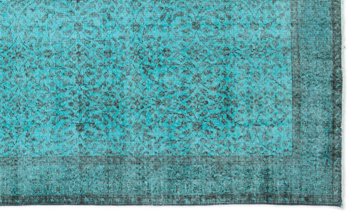 Load image 1 in gallery view. Turquoise and black rug with a distressed traditional floral medallion pattern and a wide decorative border.